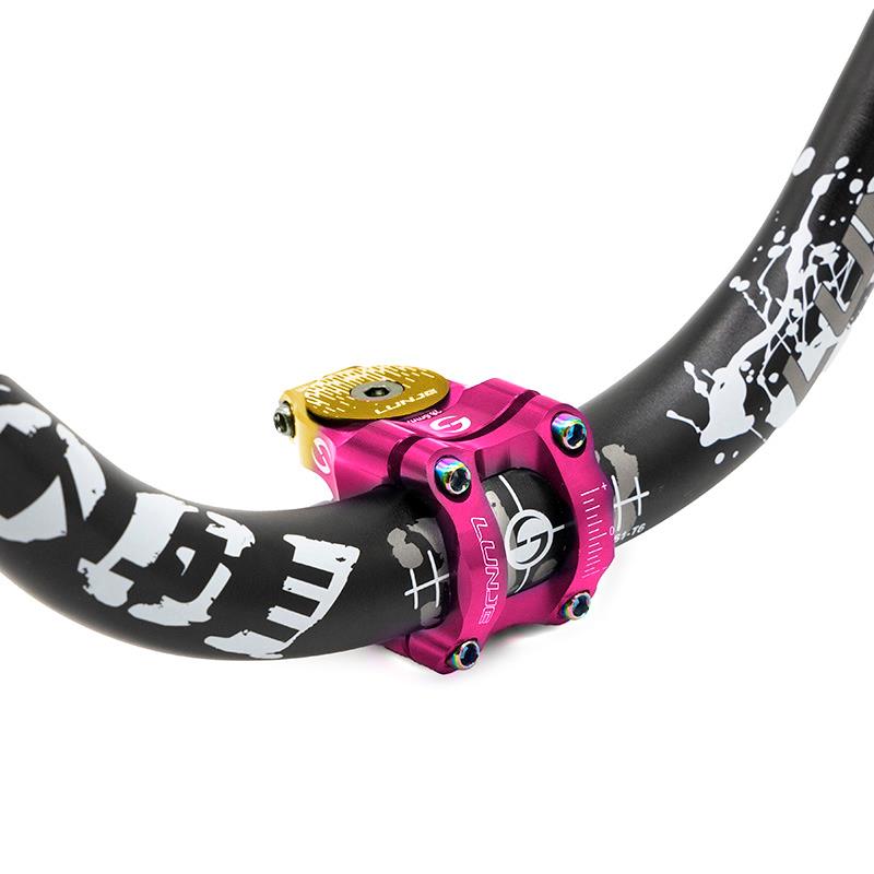 Potencia para manillares de 31,8mm rosa-amarillo